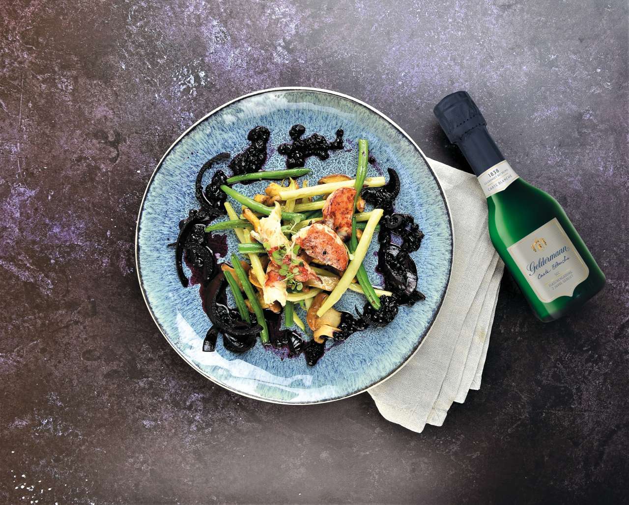 Confierter Hummer mit Pilz-Bohnen-Gemüse Confierter Hummer mit Pilz-Bohnen-Gemüse