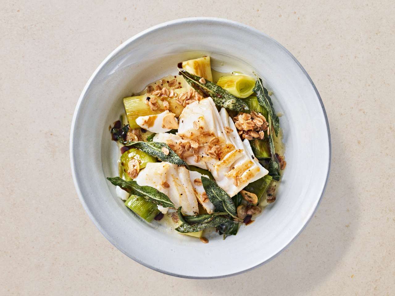 Kabeljaufilet auf geschmortem Lauch Kabeljaufilet auf geschmortem Lauch