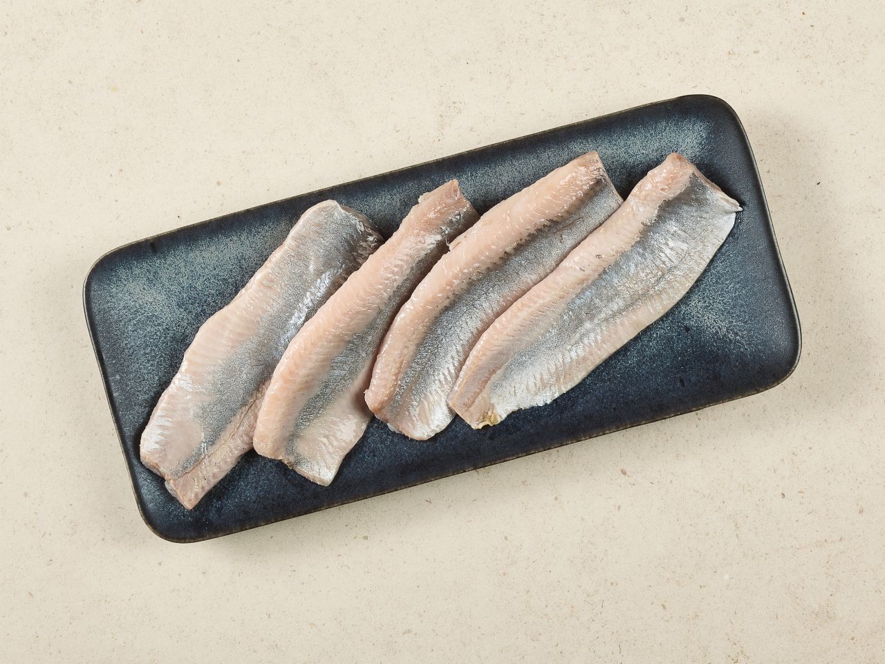 Matjesfilets nordischer Art mit zarter Rauchnote Matjesfilets nordischer Art mit zarter Rauchnote