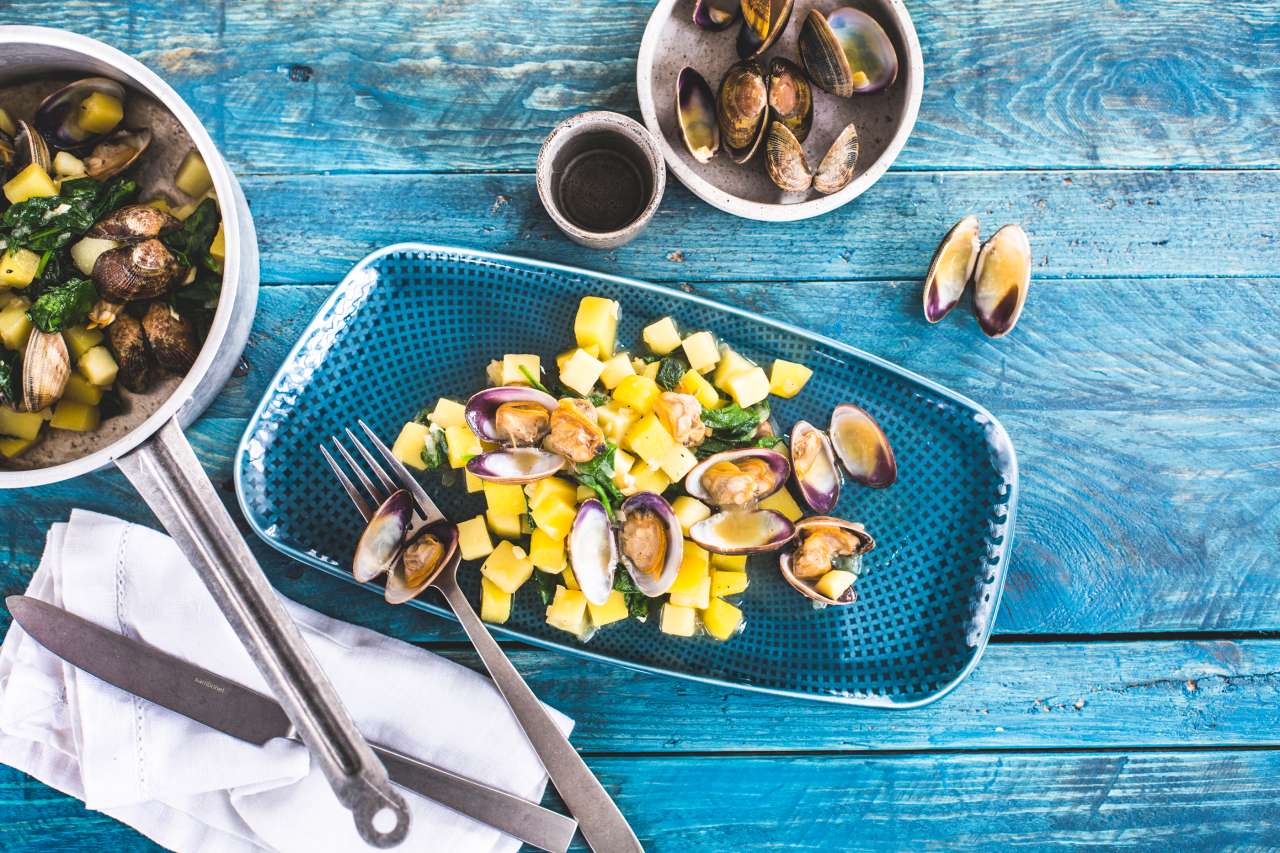 Rezept: Venusmuscheln mit Kartoffelrisotto