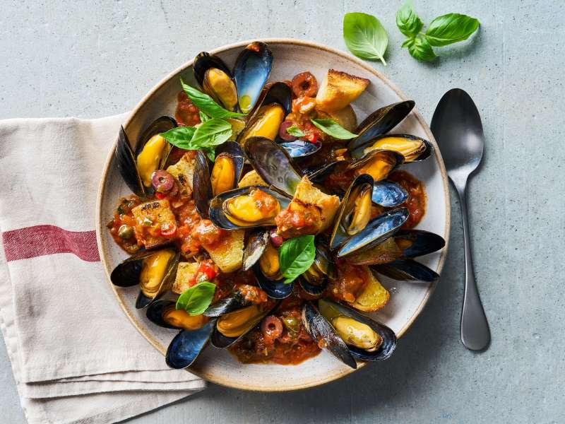 Miesmuscheln  in Puttanesca-Sauce Miesmuscheln  in Puttanesca-Sauce